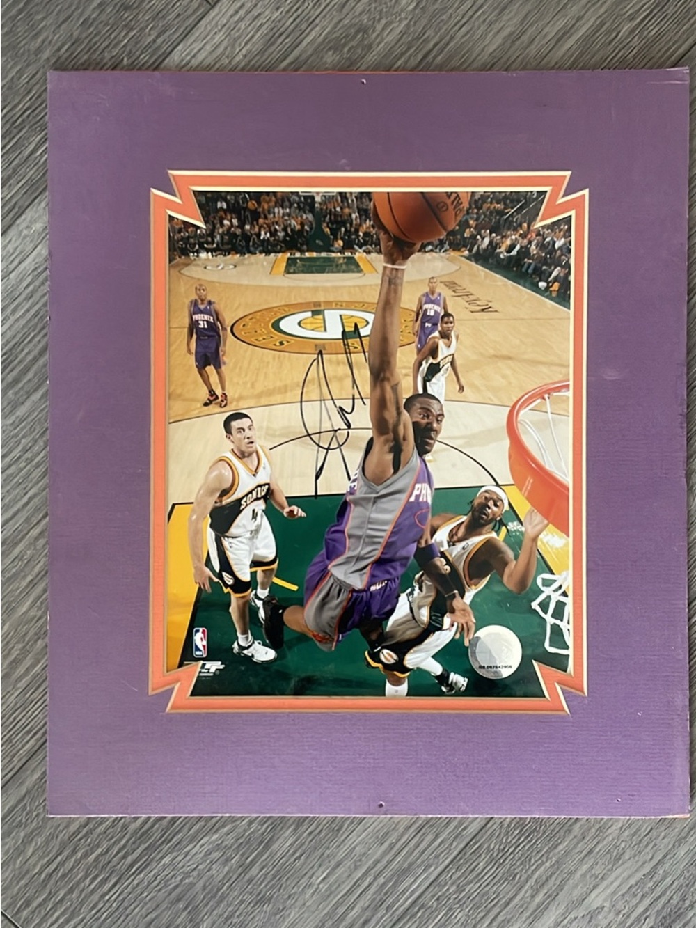 Autographed Basketball Dunk Photo with Purple & Orange Mat